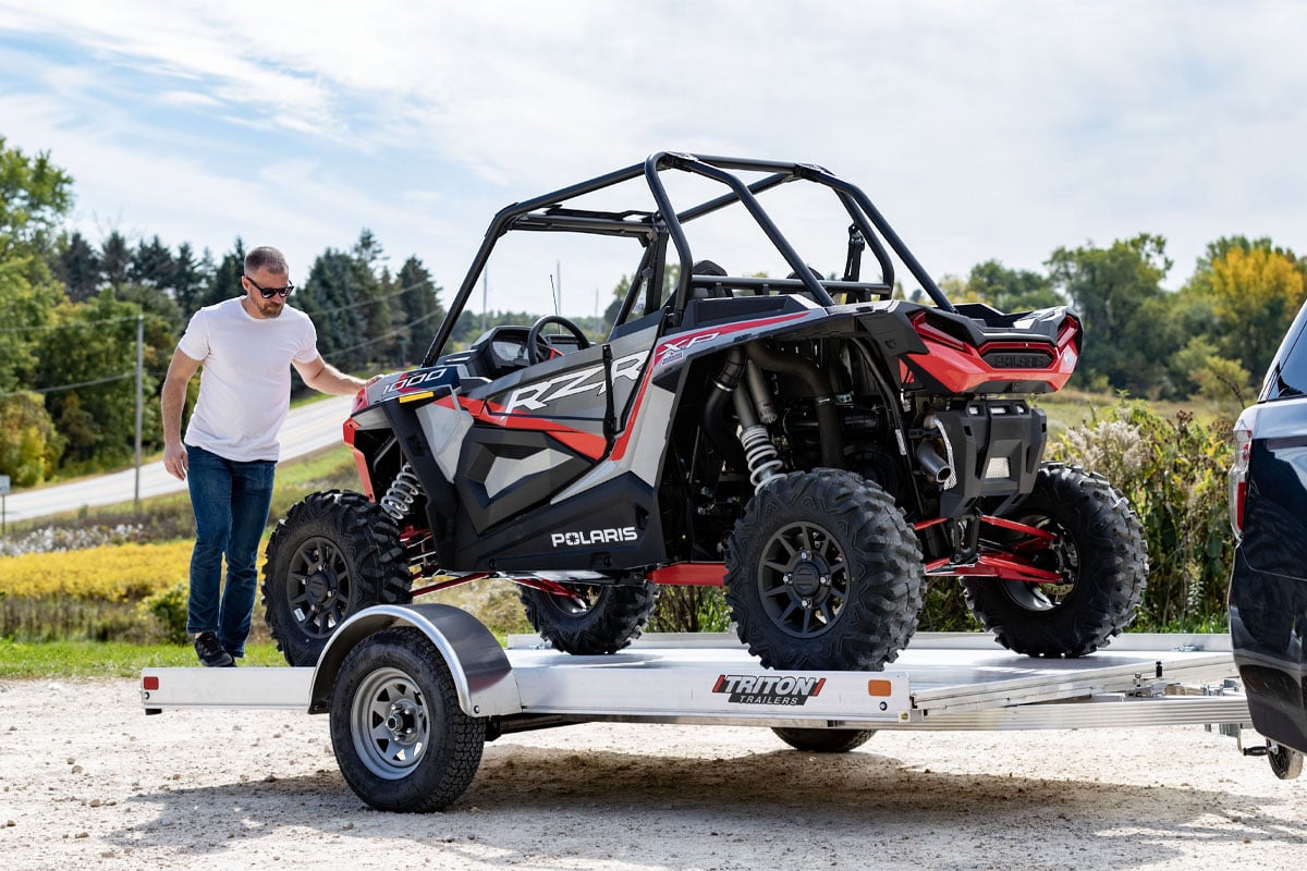 ATV Loaded On Triton Open Utility/ATV/UTV Fit Series Trailer